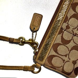 Vintage Coach wristlet in classic “C” print in brown and tan